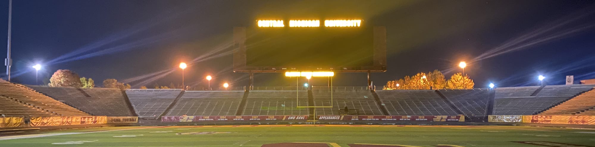 empty football stadium at night under the lights Memphis